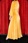 A gold velvet Suspiria maxi dress by Scorpio Rising